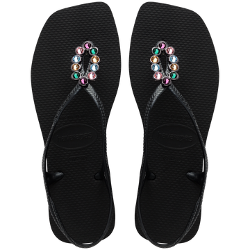 Women's black sandal featuring oval with multicolor crystal details top view