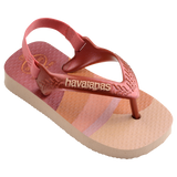 Baby flip flops with backstrap, abstract pink, beige and orange print with metallic pink straps, front right view
