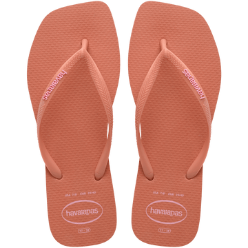 square-toe flip flop in orange color with pink havaianas logo on the strap, top facing