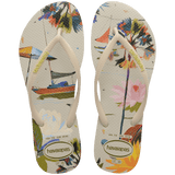 Women's boat, beach umbrella and floral print multi colored flip flop top view