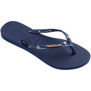 navy flip flops with navy straps adorned with pearl, crystal, and gold star charms and a gold metal havaianas logo, front right view