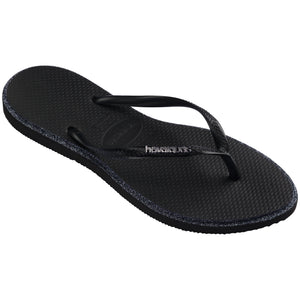 Single, right, black Havaianas flip flop with glitter accent and black logo on the strap on a transparent background