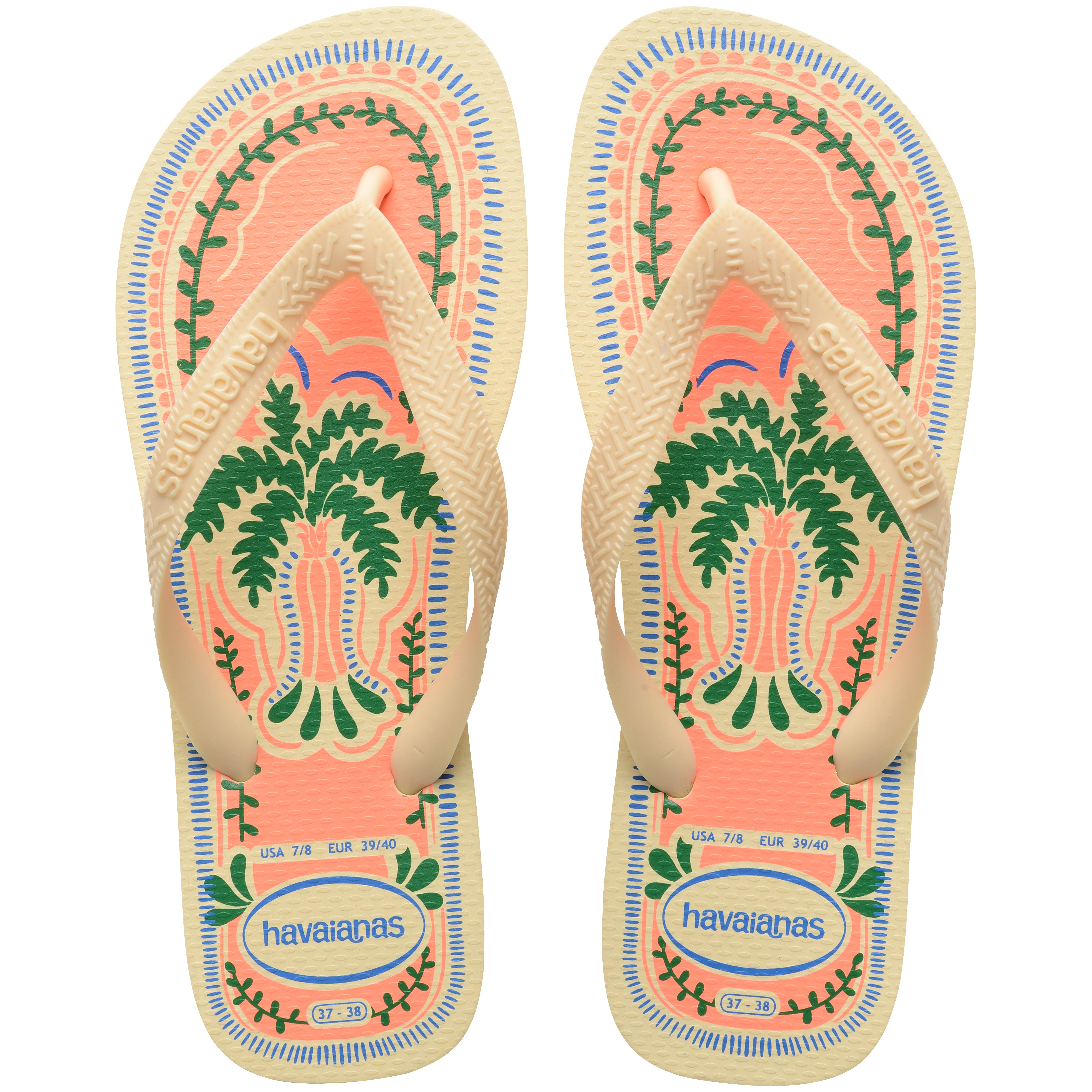 Pair of Havaianas flip flops with a tropical design on a white background