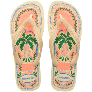 Pair of Havaianas flip flops with a tropical design on a white background