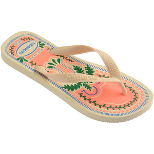 Single, right Havaianas flip flop with a tropical design on a white background
