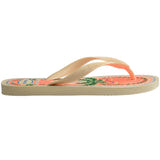 Single, side view, right Havaianas flip flop with a tropical design on a white background