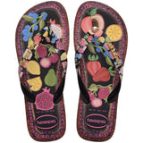 Pair of Havaianas flip flops with fruit design on a white background