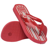 Kids' red Havaianas Disney flip-flop shown from an angled top and bottom view. The sandal features red textured straps with an embossed Havaianas logo, a red-and-white striped footbed with a Minnie Mouse graphic, and a red rubber outsole with a textured tread pattern for traction.