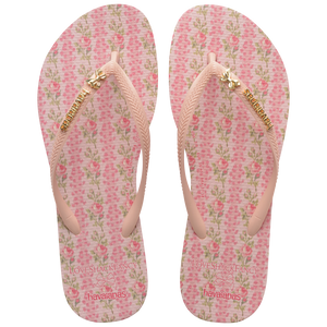 havaianas x LoveShackFancy pink flip flops with floral pattern and bow charm top view