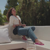 Model wearing the Top flip flop in pink.